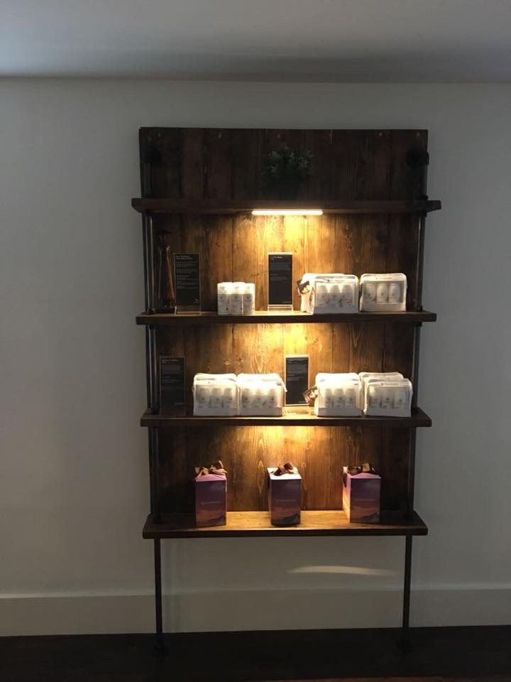 Lit display shelving installed by Dew Electrics
