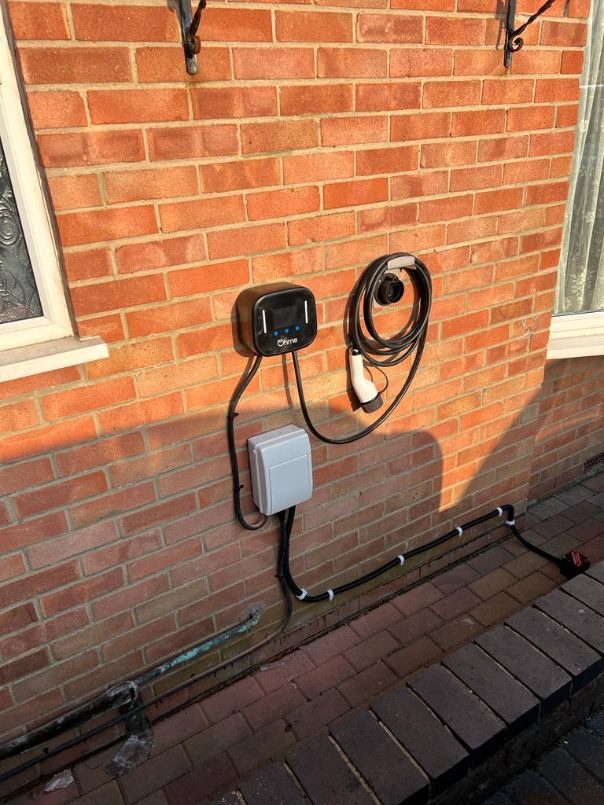 Wall-mounted EV charger with isolator