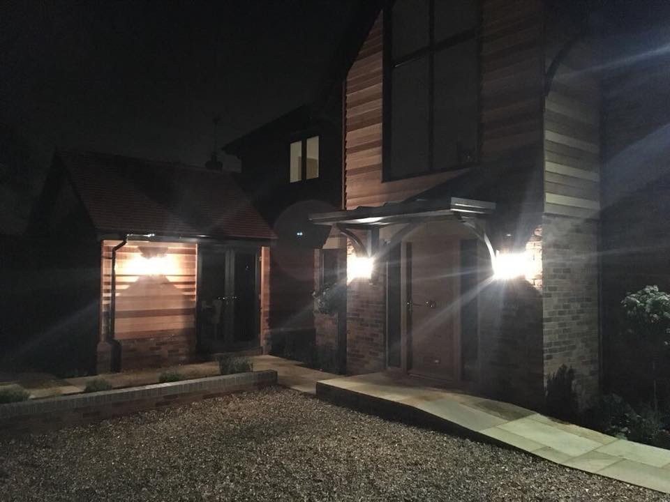 House exterior wall lights at night