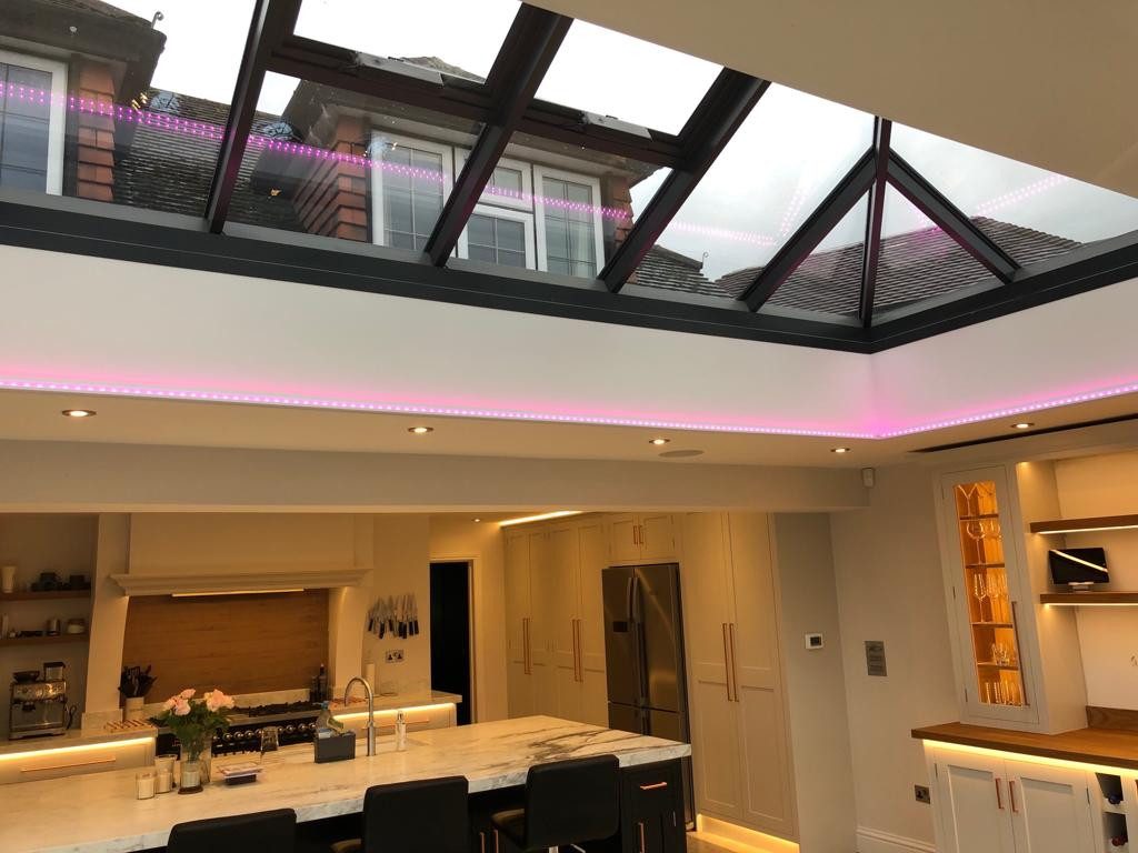Kitchen under a roof lantern with LED strip lighting