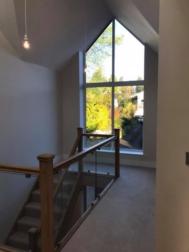 Staircase under a glazed gable